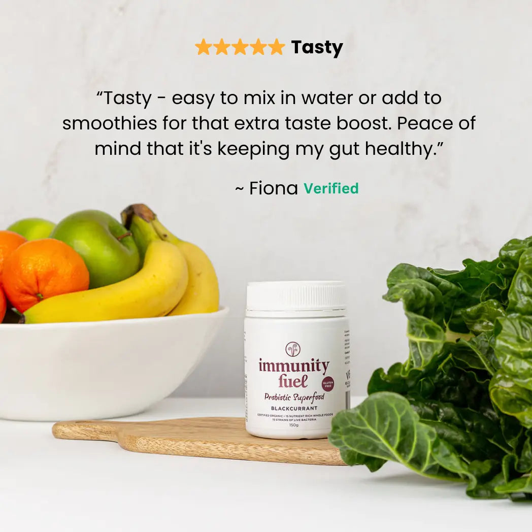 Blackcurrant Probiotic Superfood Powder 3 Pack with fresh fruits and greens, showcasing its taste and health benefits.